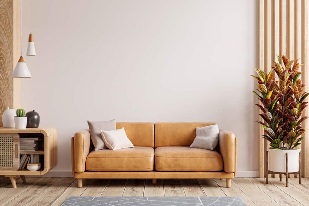 Modern living room with beige sofa and stylish decor in Singapore home.